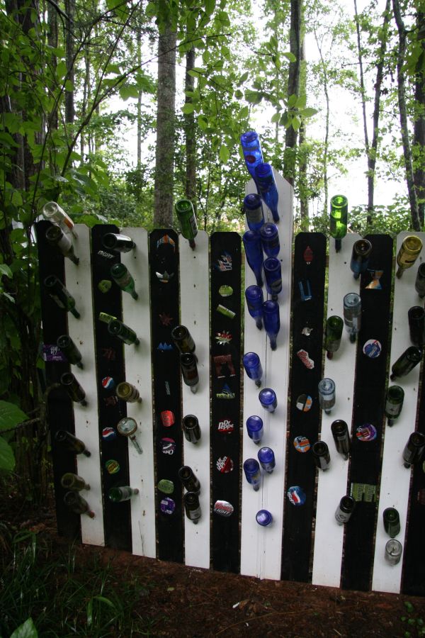 rainboot-garden-on-a-fence