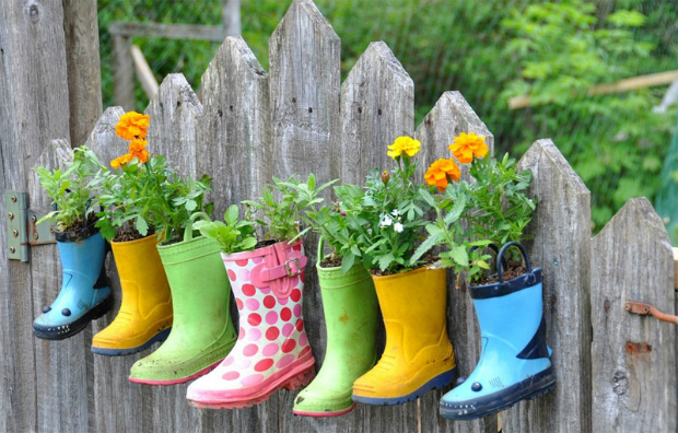 rainboot-garden-on-a-fence