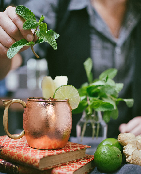 Mint next to a copper mug