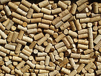 Wine bottle corks behind glass.jpg