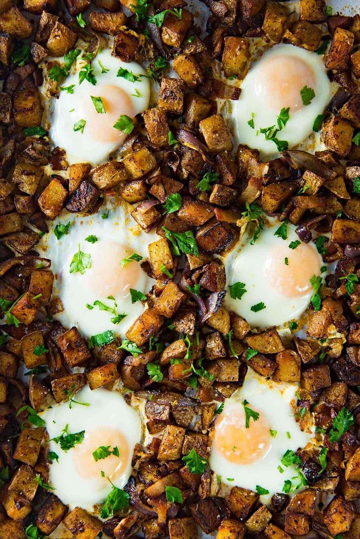 Sheet pan breakfast potatoes with bacon and eggs - Cook all the ingredients in the same sheet pan, so you can relax and let the oven make your breakfast on weekends. Plus with tips on how to make this for busy weekday mornings too. 